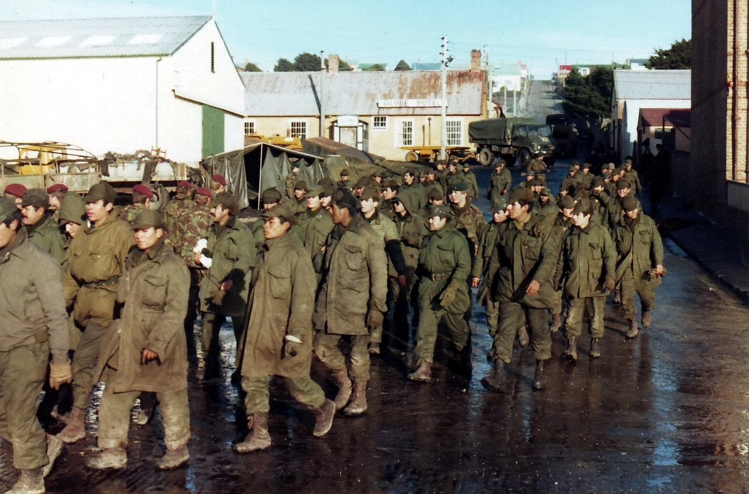 Argentine prisoners of war in Port Stanley following the Argentine surrender, June 1982. A historic scene marking the end of the 74-day conflict. Photographed by Ken Griffiths, a Royal Marine who served during the conflict.